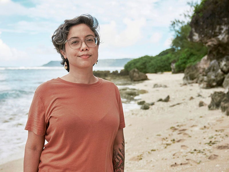 Monaeka Flores, photographed on Inapsan Beach on Guam, where her family had ranched the land for generations.